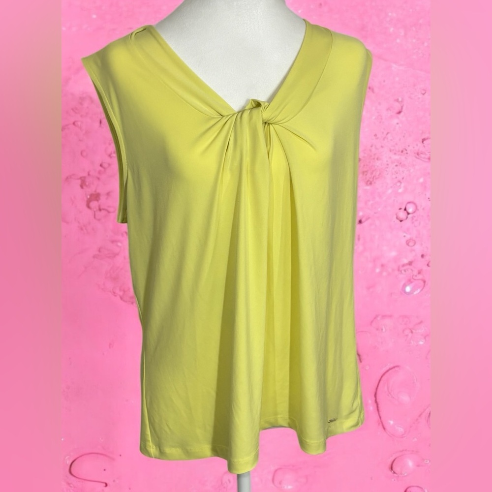 Calvin Klein yellow blouse. NWOT. Size XL. Beautiful blouse!Great Condition!